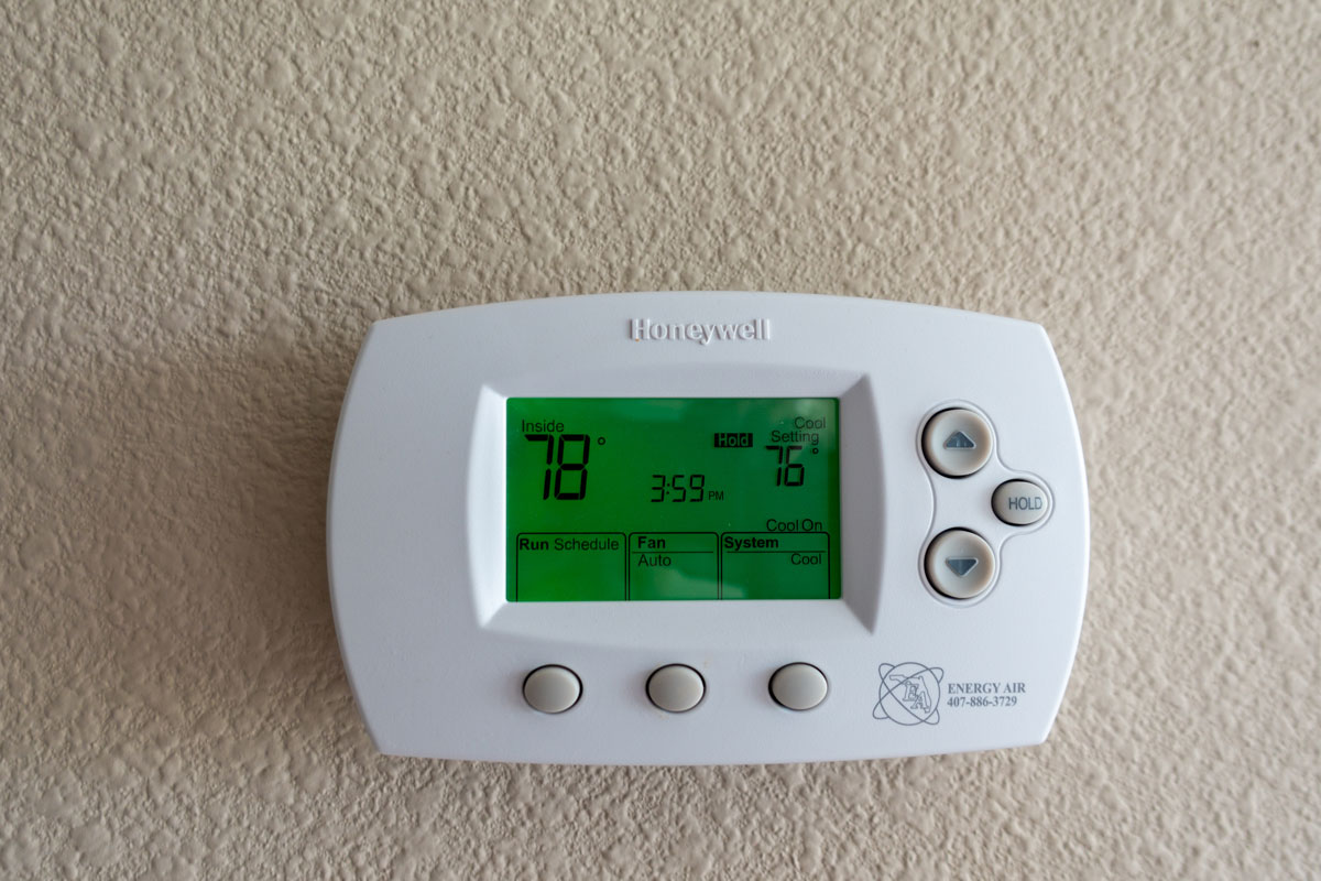 A Honeywell thermostat mounted on the wall