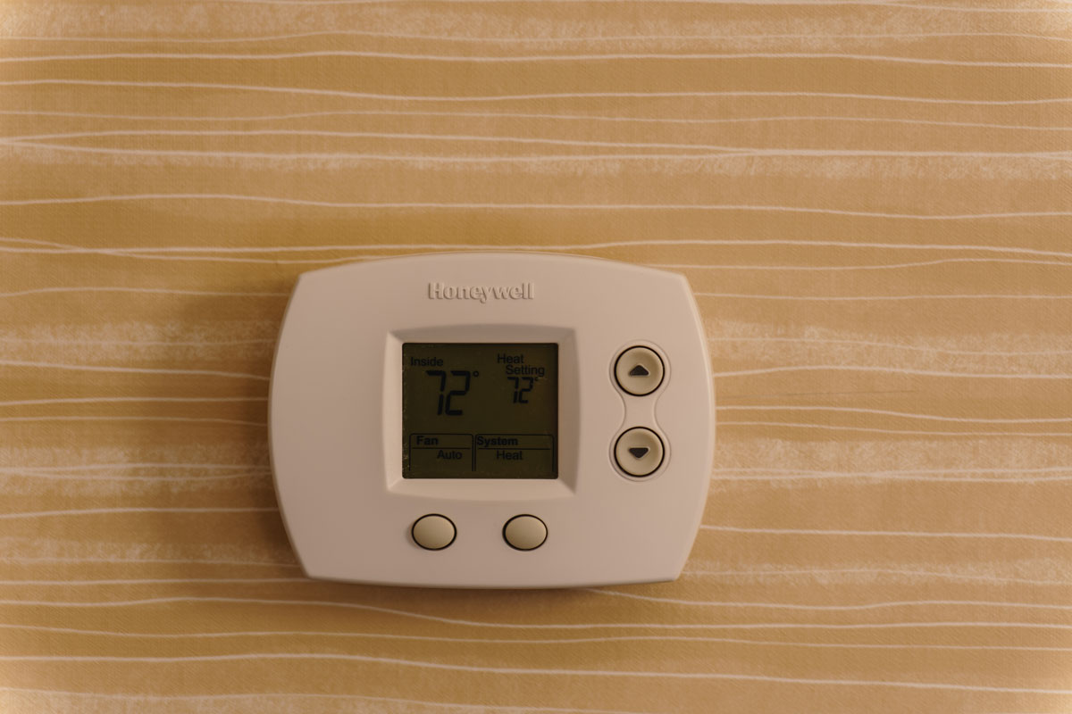 A Honeywell thermostat set to 72 degrees fahrenheit