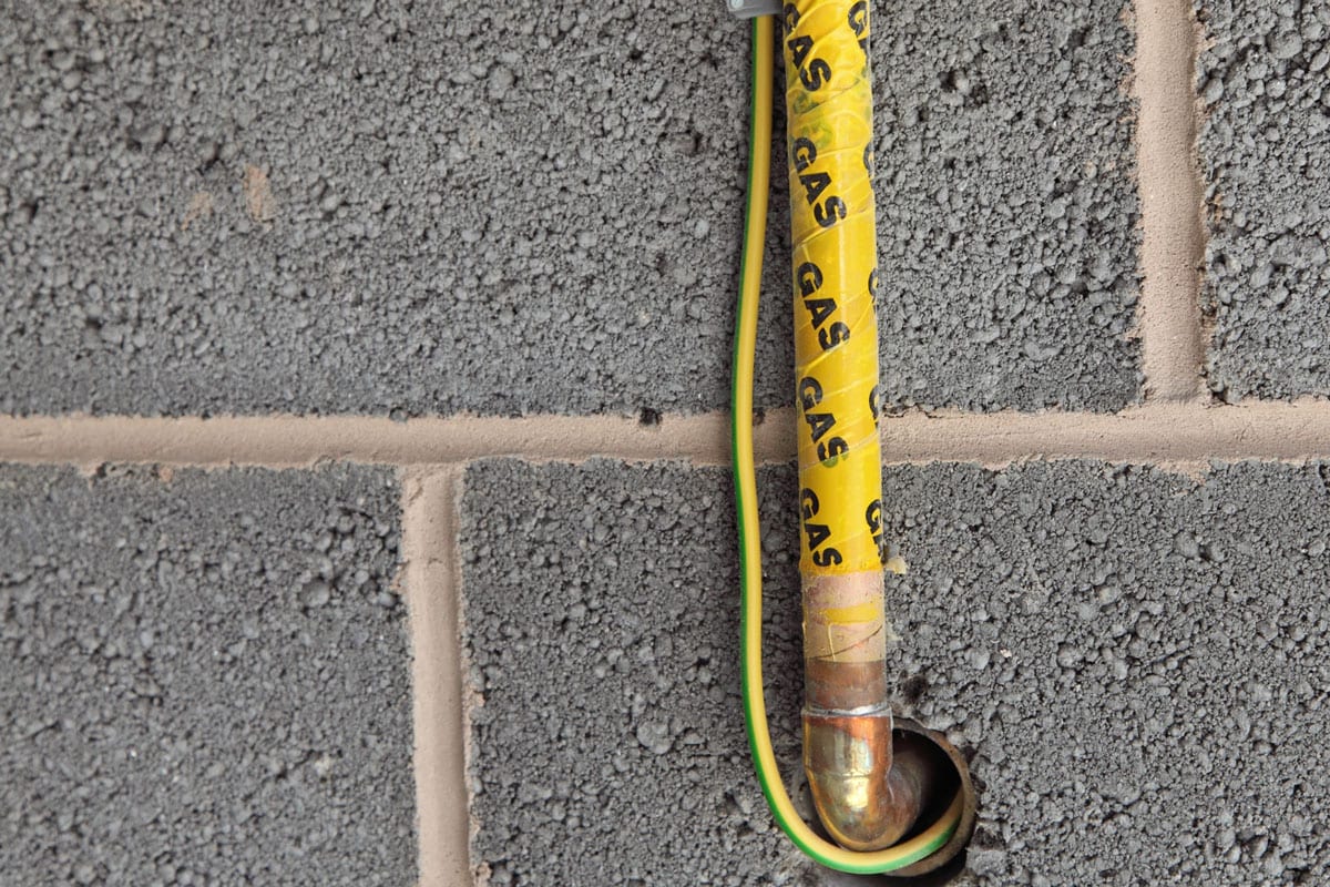 A new central heating gas pipe with earth cable