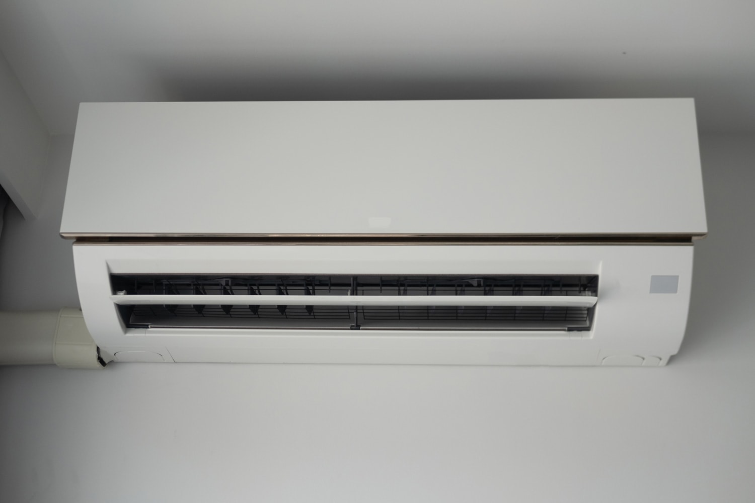 Air conditioner cooling fresh system saving energy on white wall background