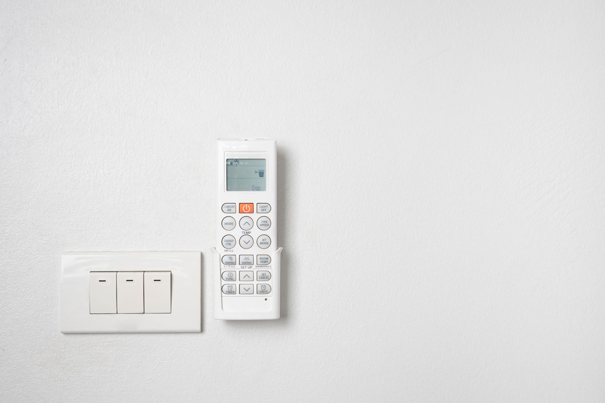 Air conditioning control remote hanged on the wall