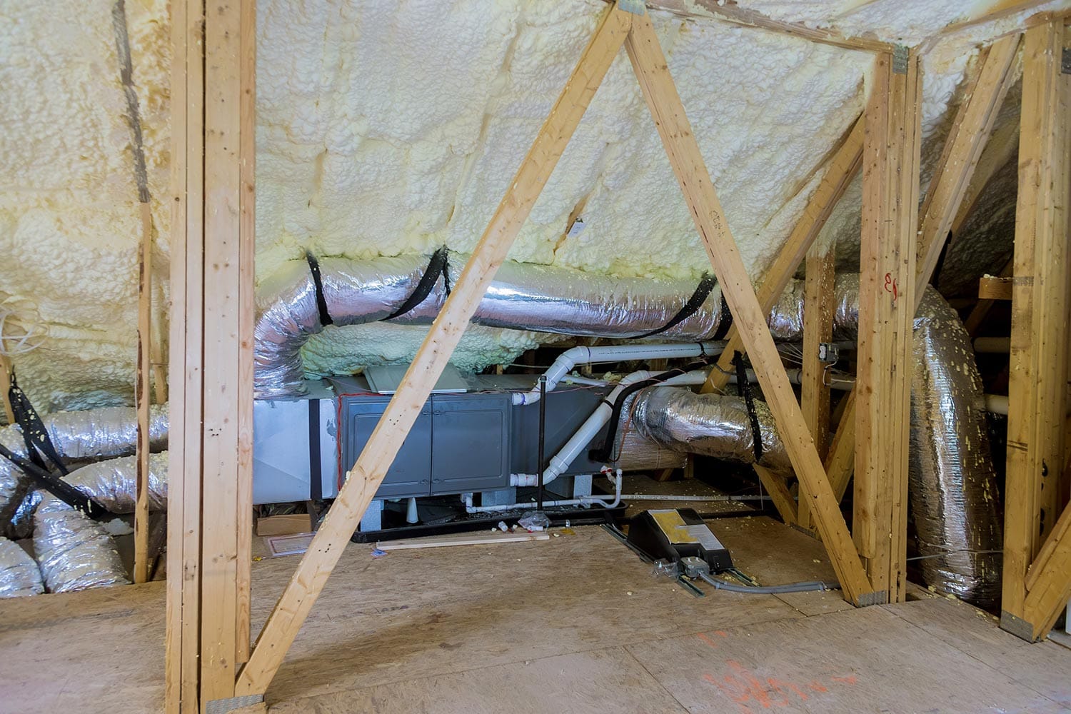 Air conditioning system attached to attic thermal foam plastic insulation