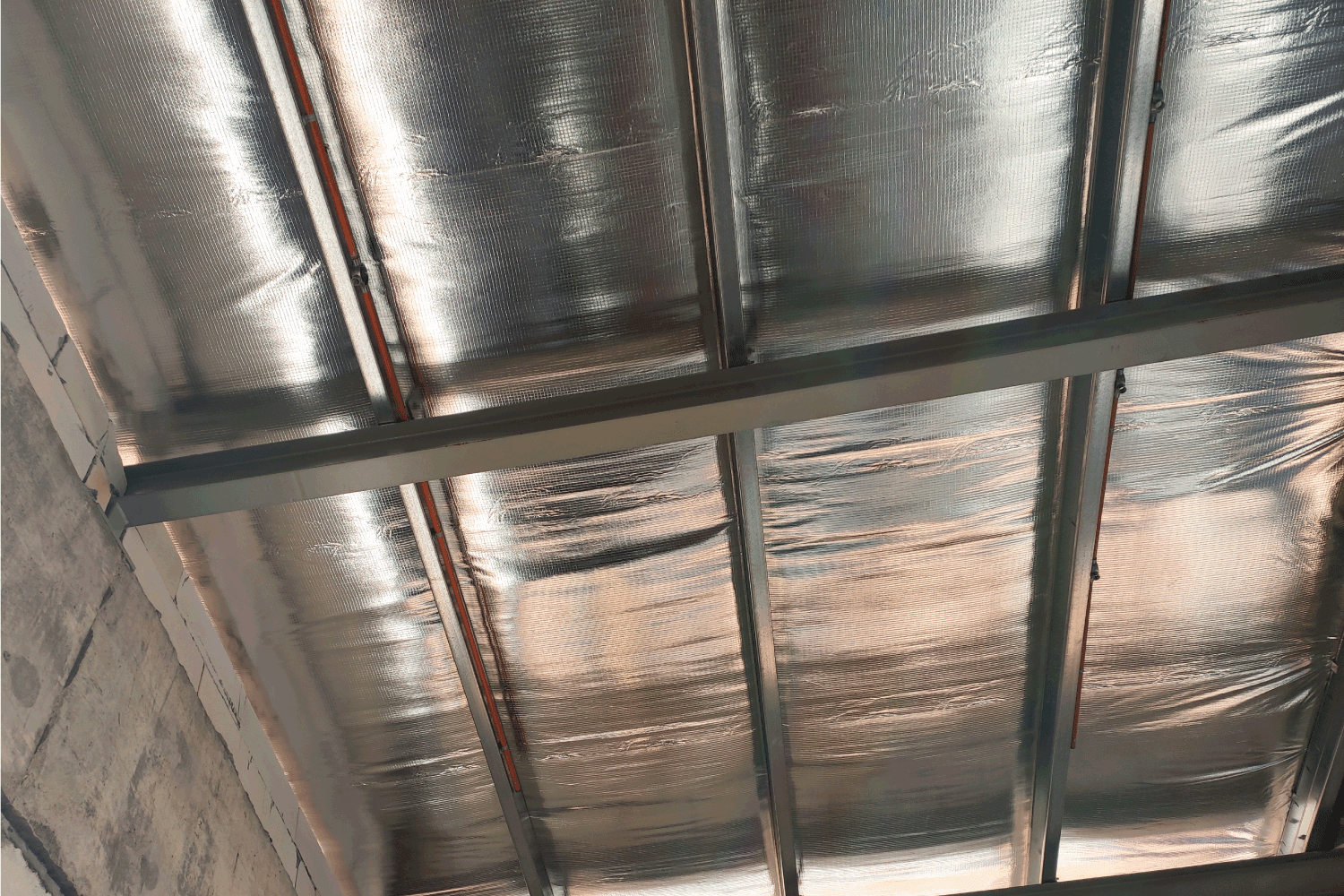 Aluminum foil sheets are used as thermal insulation of the roof. Placed under the roof layer. 