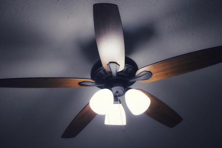 A ceiling fan in a room, How To Measure Fan Blade Pitch?