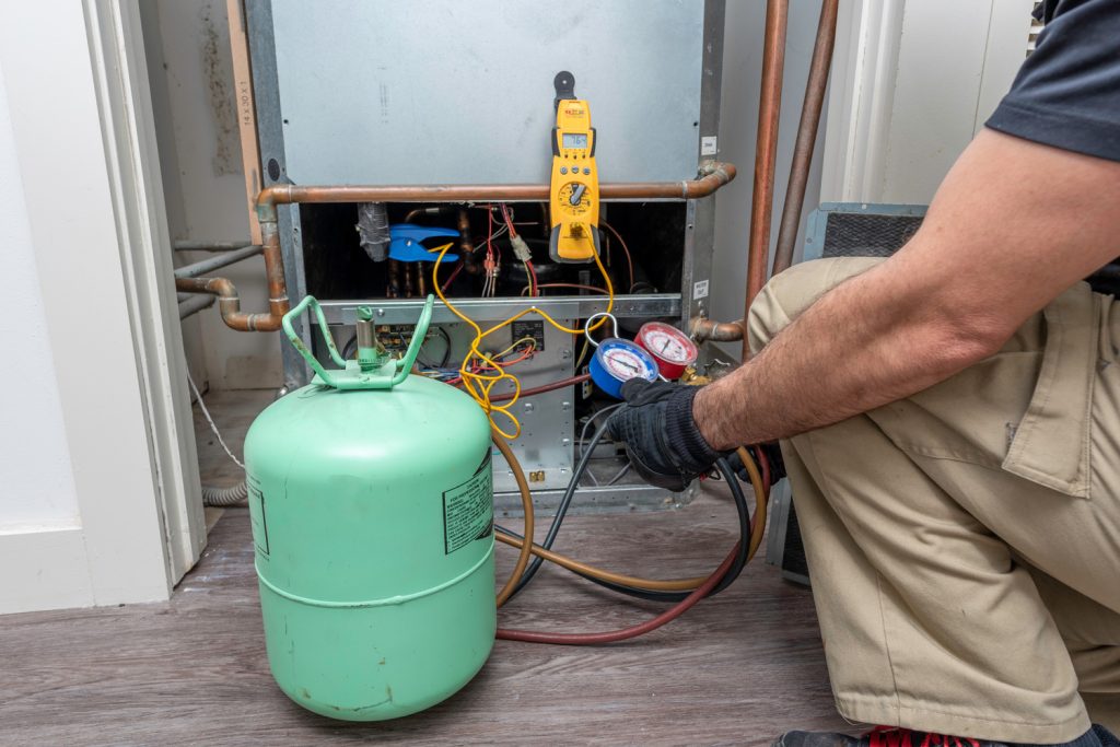 Charging a heat pump with refrigerant