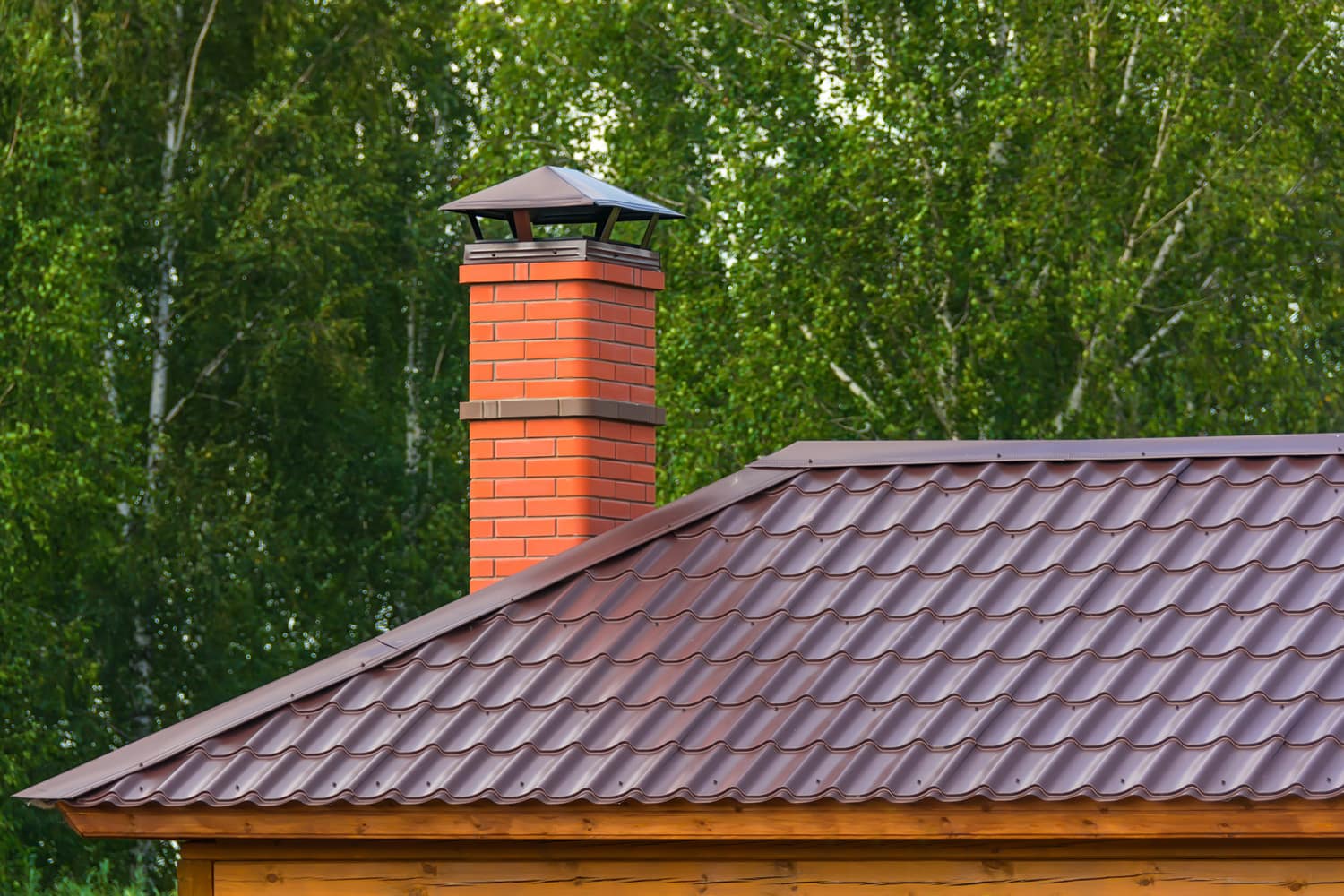 Chimney on roof of country house