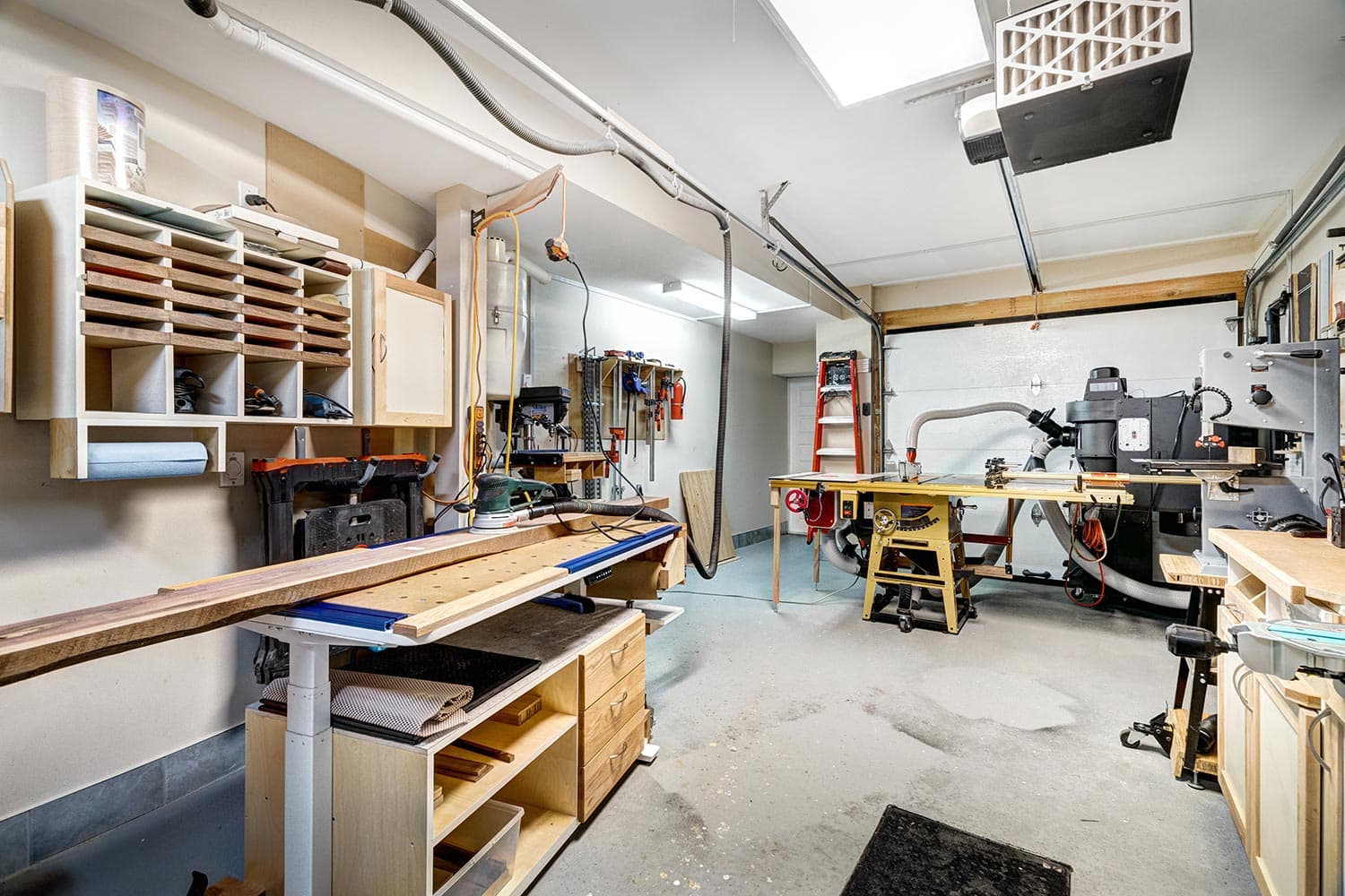 Garage workshop for cabinet making and wood working with tools and equipment