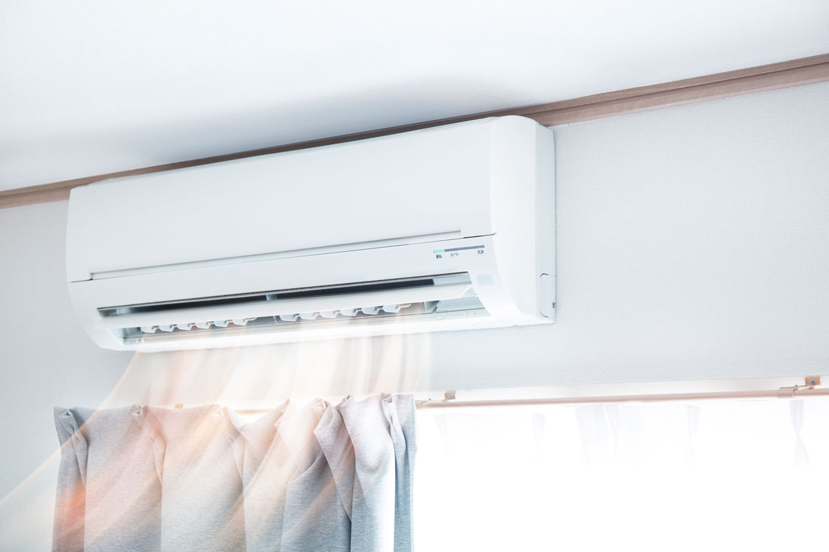 Mini split air conditioning units inside a bright living room