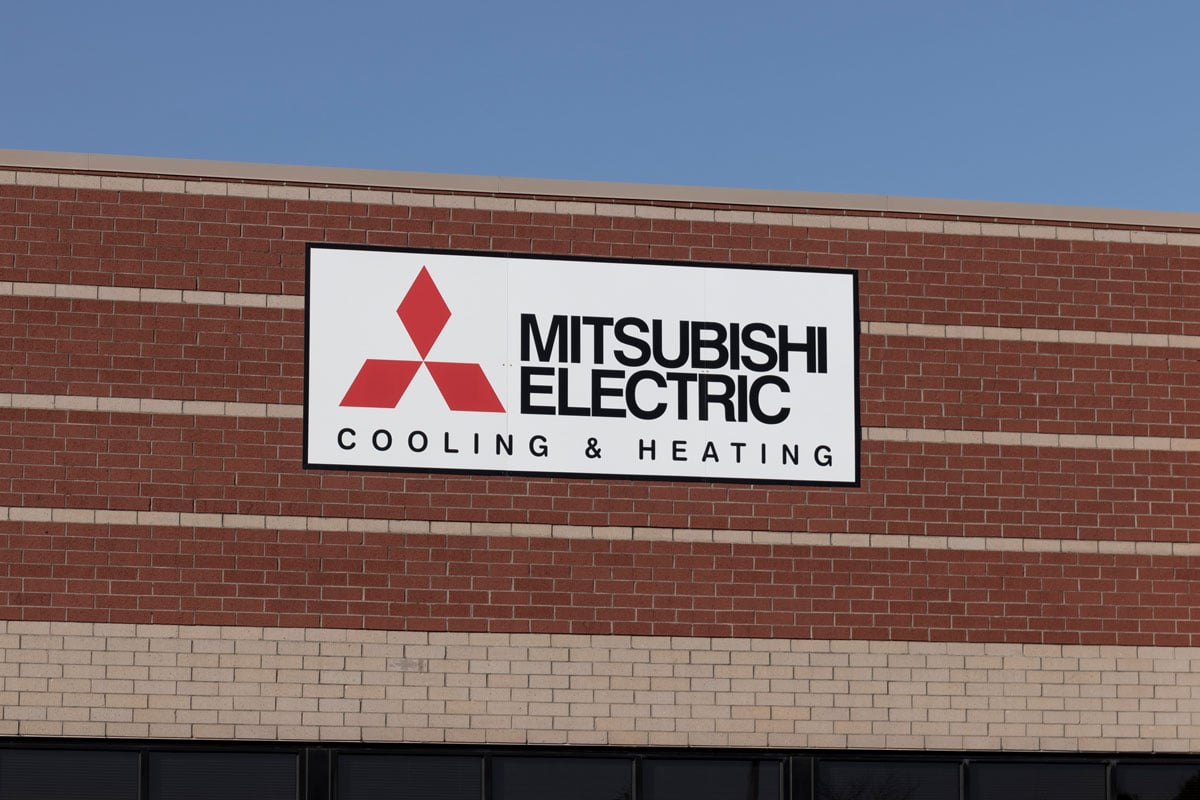 Mitsubishi sign mounted on the factory exterior wall