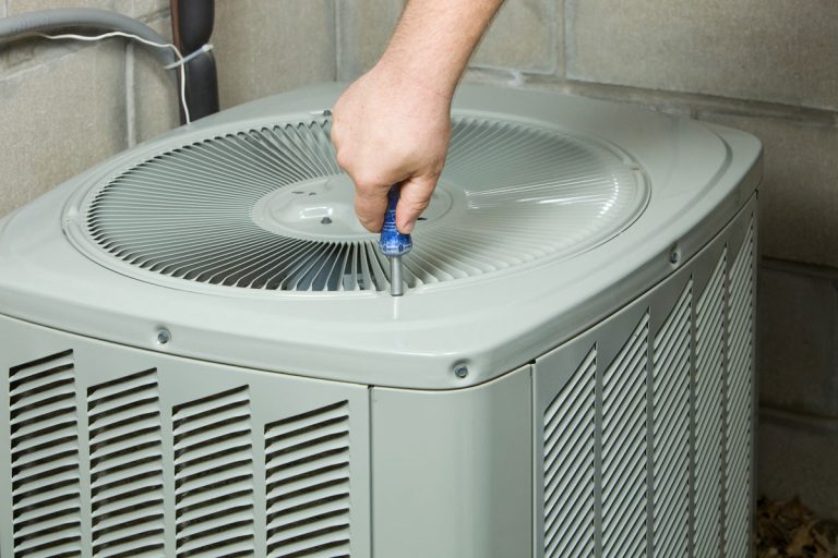 Service Technician Removing or Installing Air Conditioner Fan Cover, Armstrong Air Conditioner Tonnage: How To Find What Yours Is