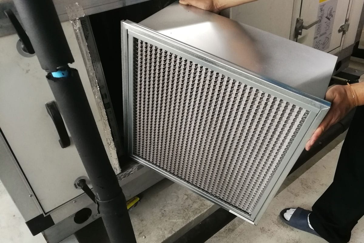 Technician removing the furnace filter