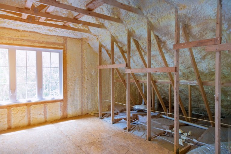 Thermal insulation a new house under the roof of air conditioning on the roof, How Much Does Closed Cell Spray Foam Cost?
