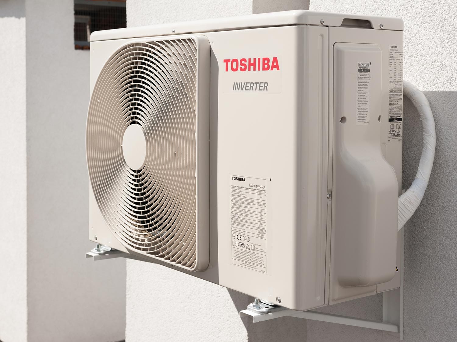 Toshiba air conditioner outdoor unit installed on the wall