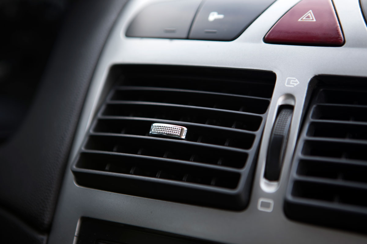 Up close photo of cars air conditioning fan photographed up close