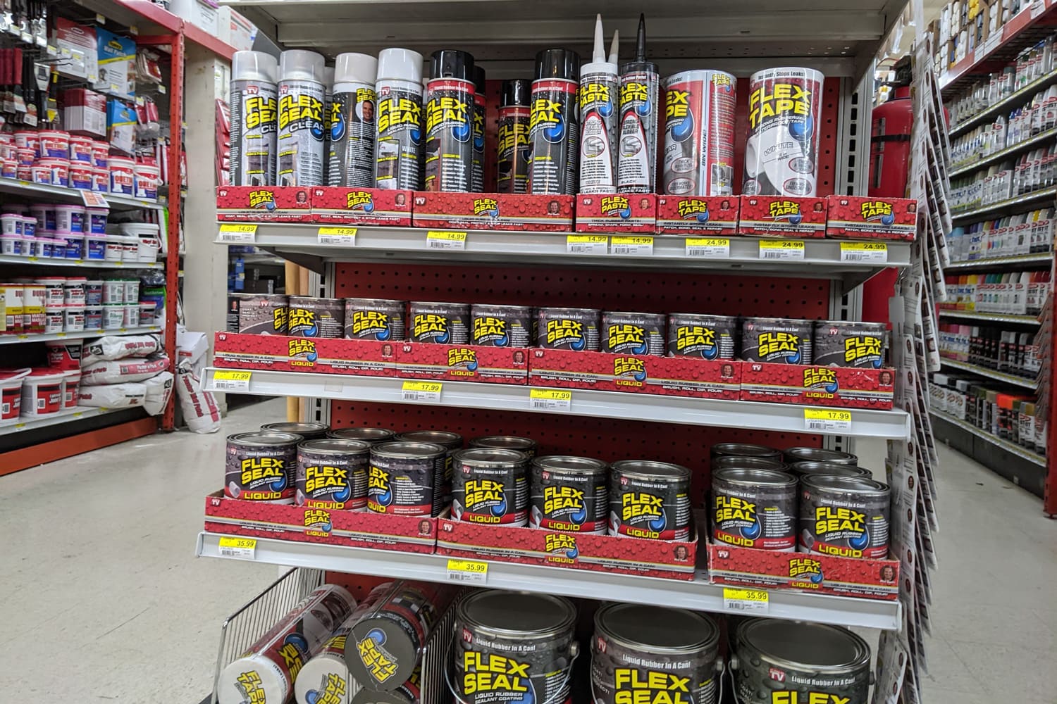  View of a Flex Seal and Flex Tape endcap inside a McLendon Hardware Store.