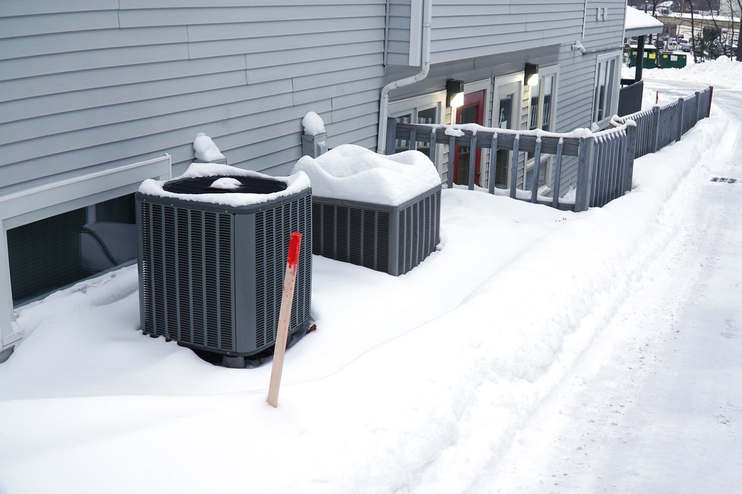 air conditioner compressor outdoor in snow