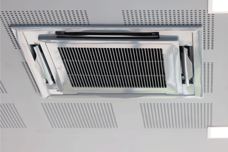 cassette type air conditioner or air handler or coil fan unit in modern office. Air Handler Vs Air Conditioner: What's The Difference