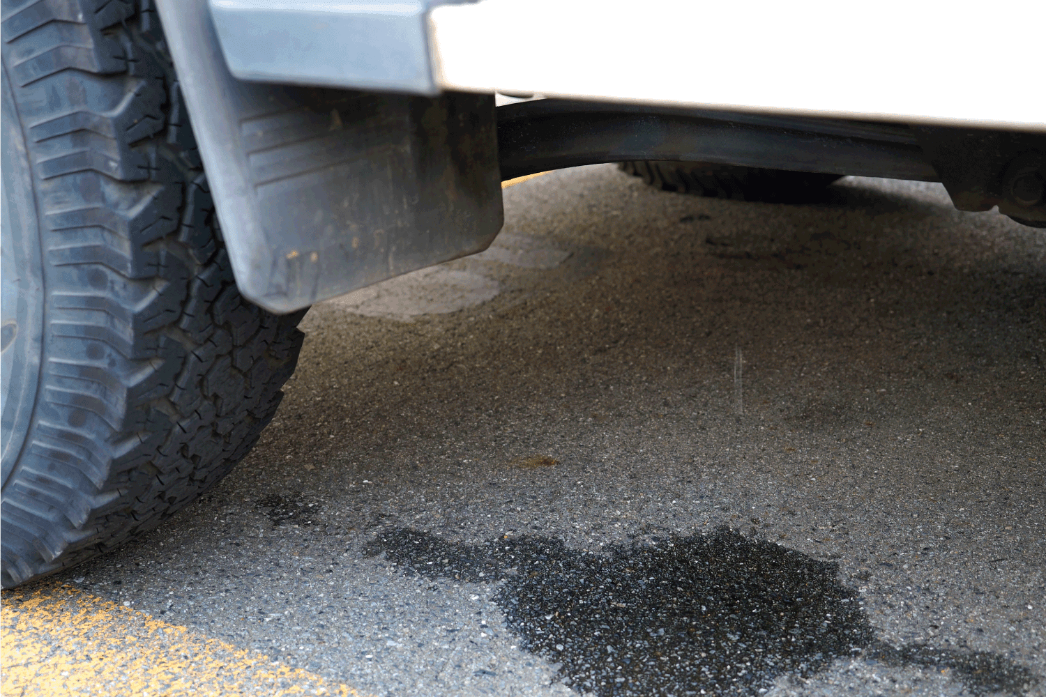 water dripping from the vehicle drainage