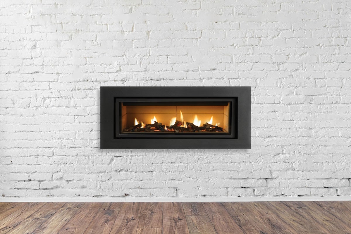 A black stainless covered fireplace mantel