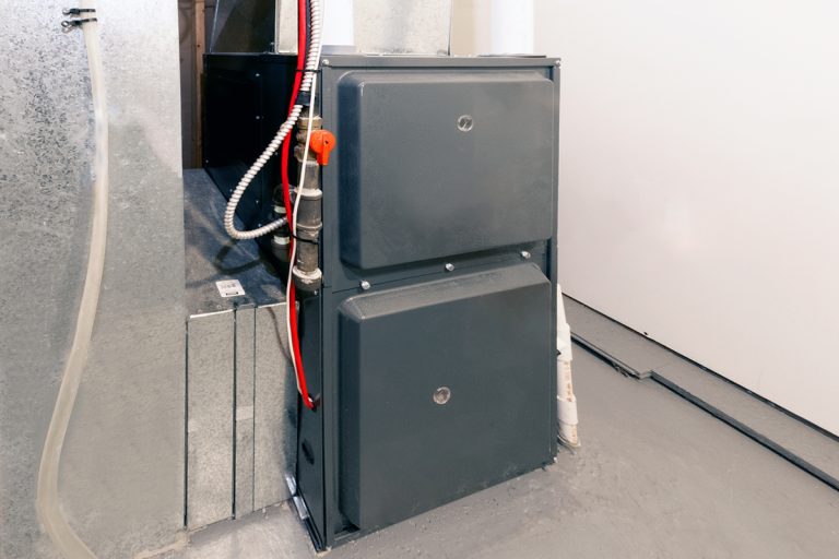 A home high energy efficient furnace in a basement, Furnace Working But Not All Burners Lighting - What To Do?