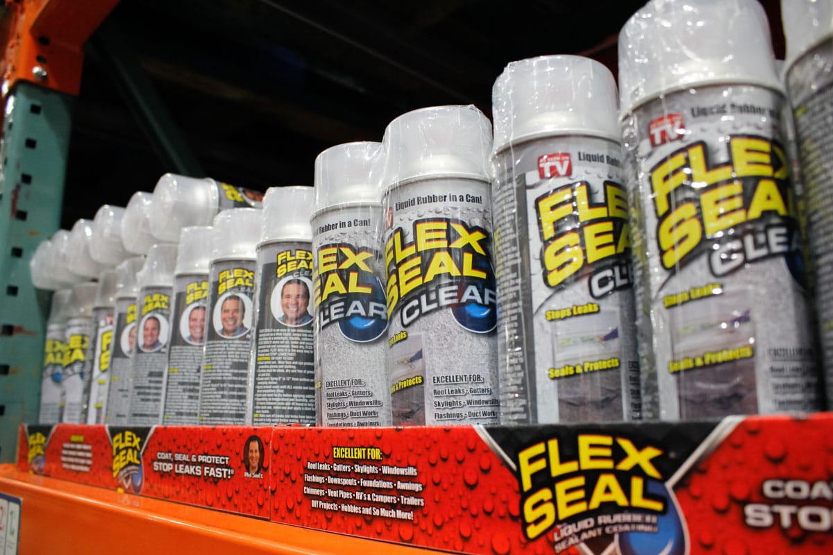 A view of several cans of Flex Seal Clear, on display at a local hardware store