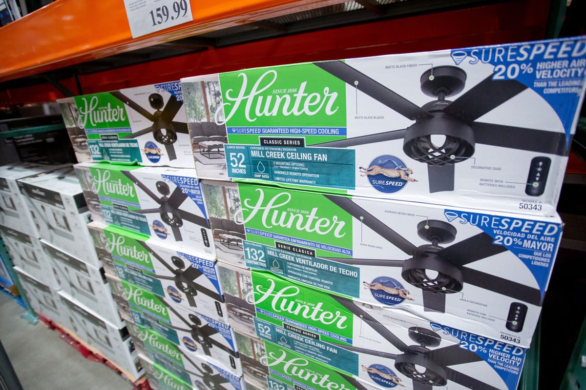 A view of several packages of Hunter ceiling fans, on display at a local big box grocery store