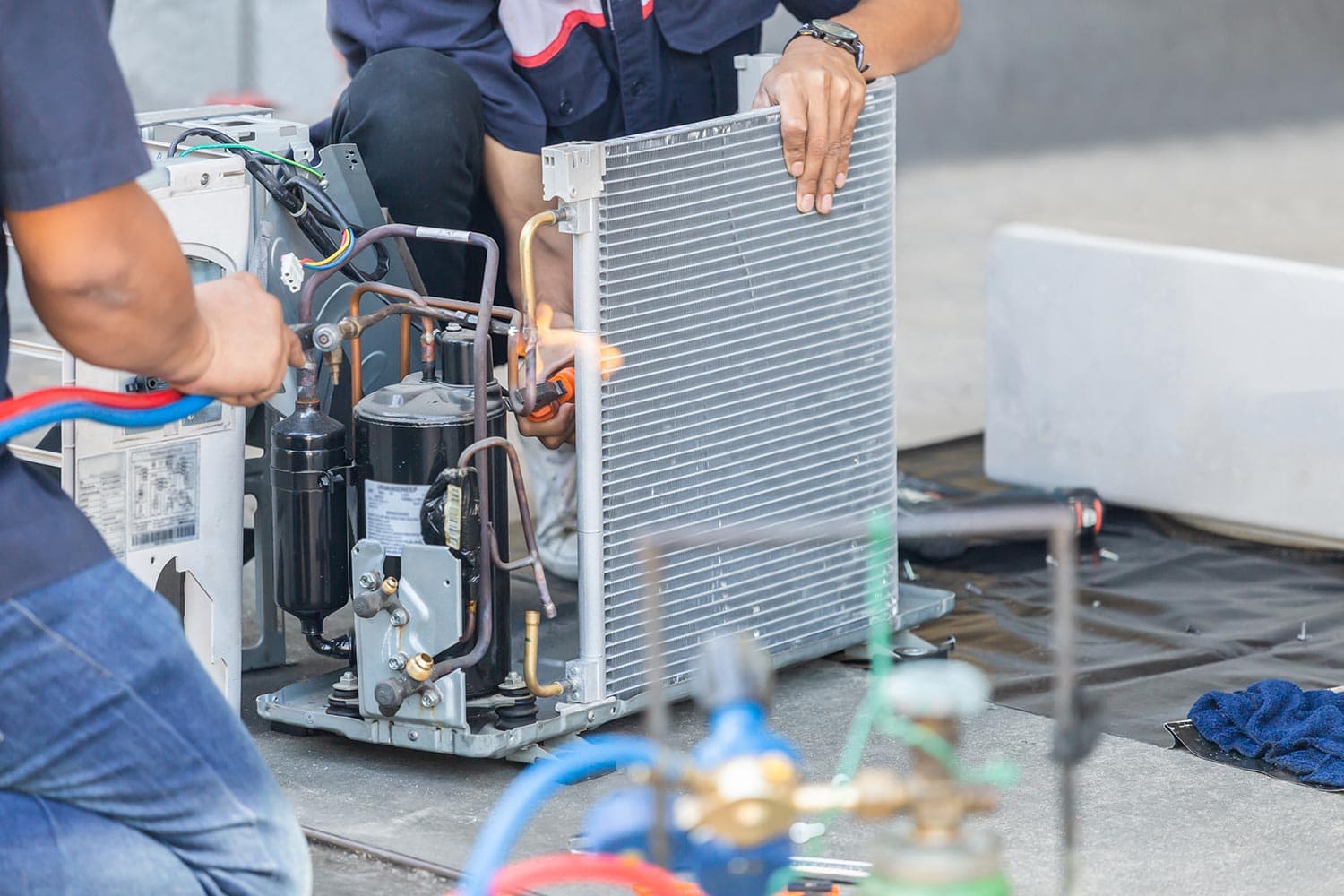 Air Conditioning repair team use fuel gases and oxygen to weld or cut metals