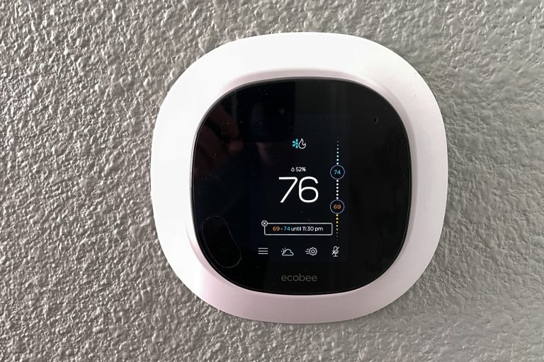 An Ecobee smart thermostat in a home - Is Ecobee A Two Stage Thermostat