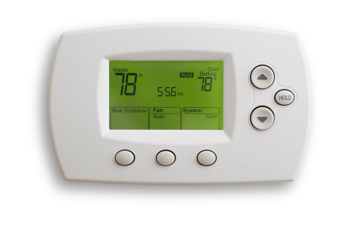 An Honeywell thermostat on a white background