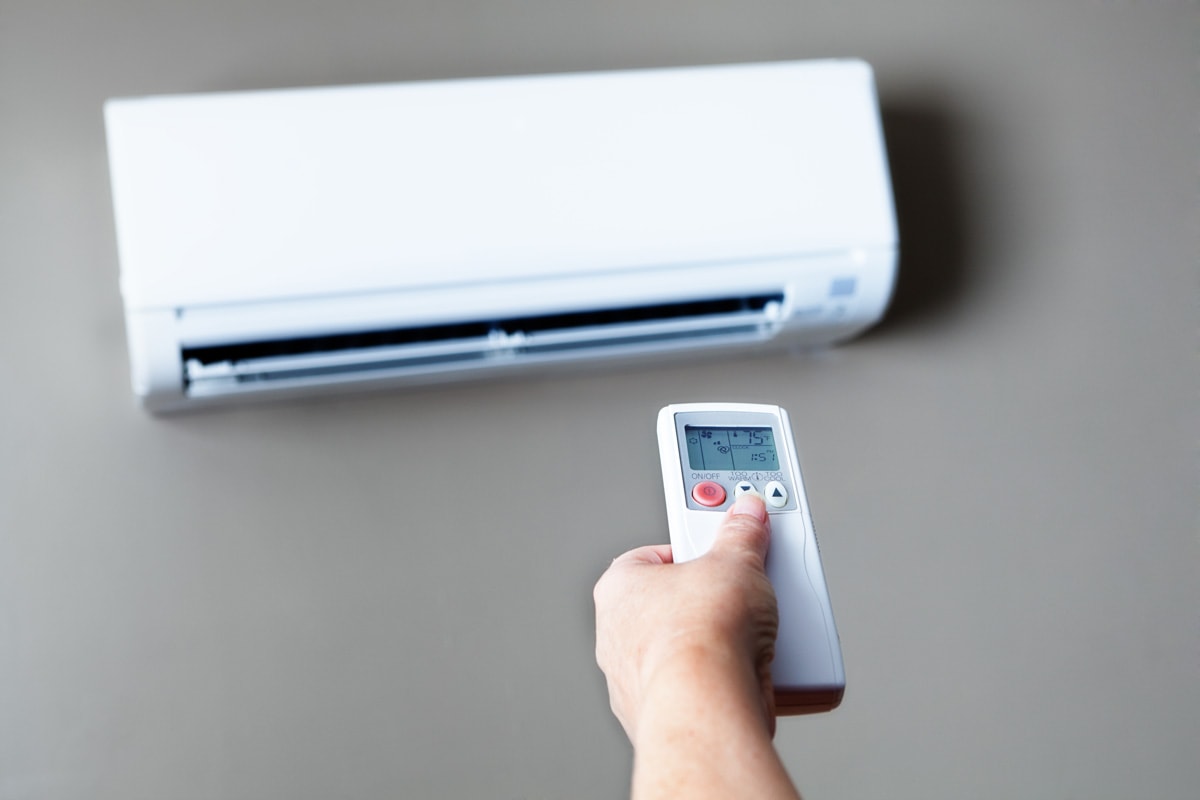 Changing the air conditioning temperature using a remote