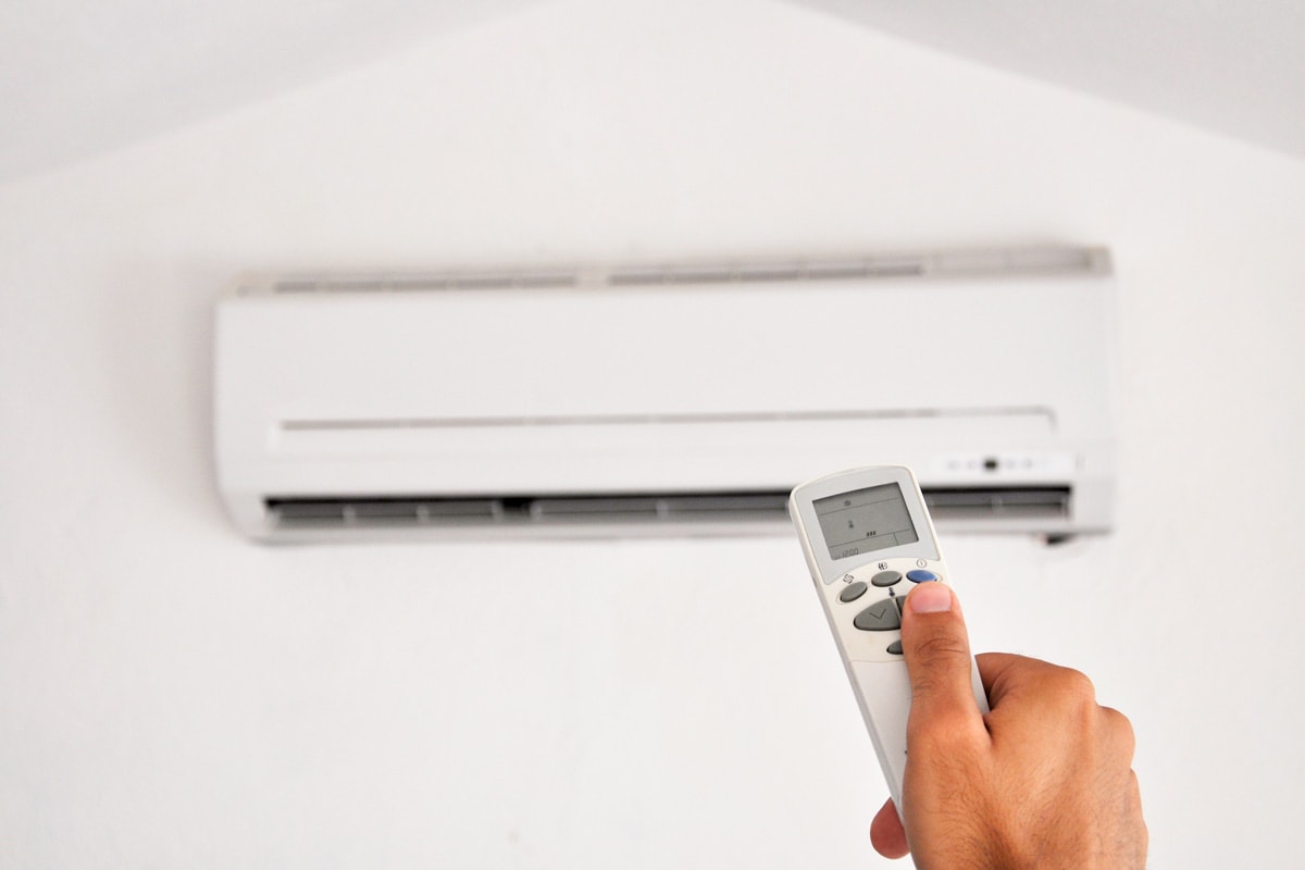Changing the temperature of the living room air conditioning unit