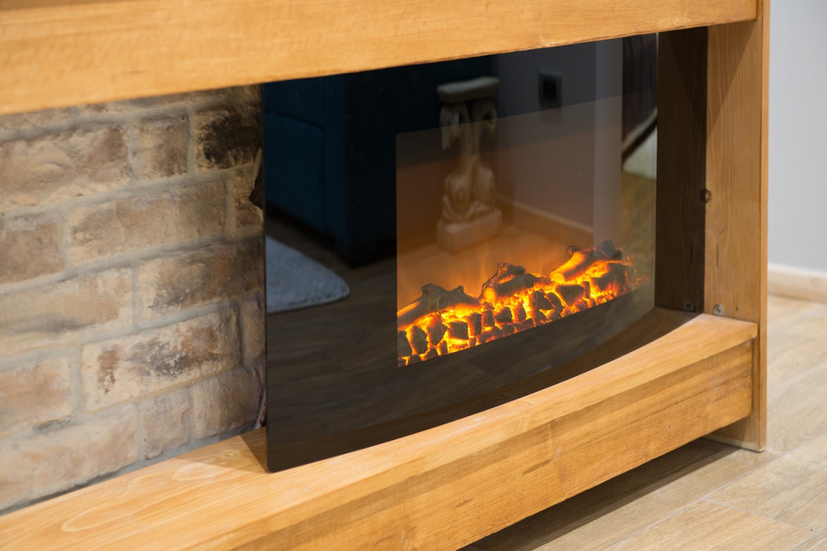 Close-up of electrical fireplace in living room
