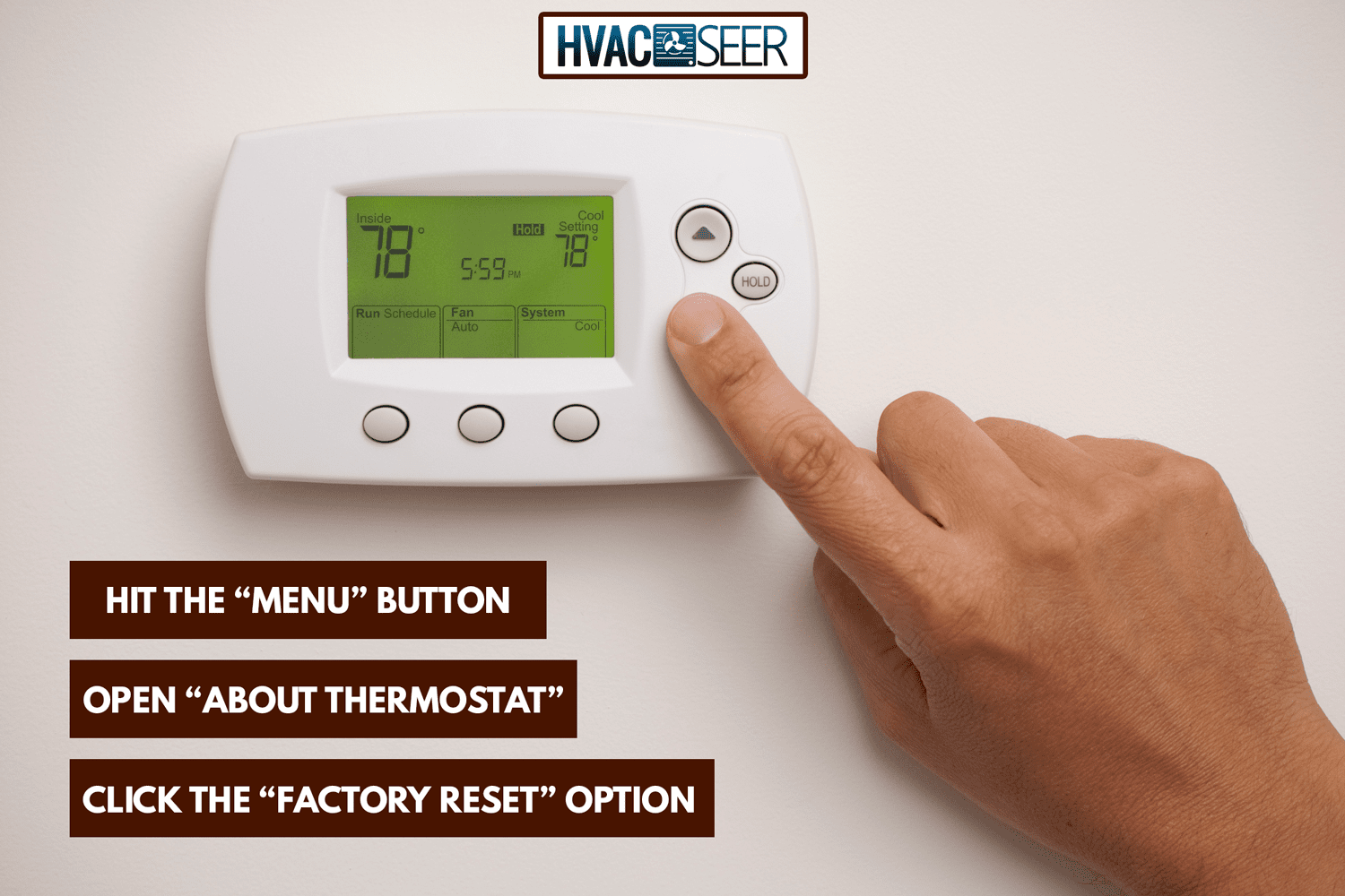 Digital Thermostat with a male hand, set to 78 degrees Fahrenheit. Saved with clipping path for thermostat and hand combined. - How To Reset An Emerson Thermostat