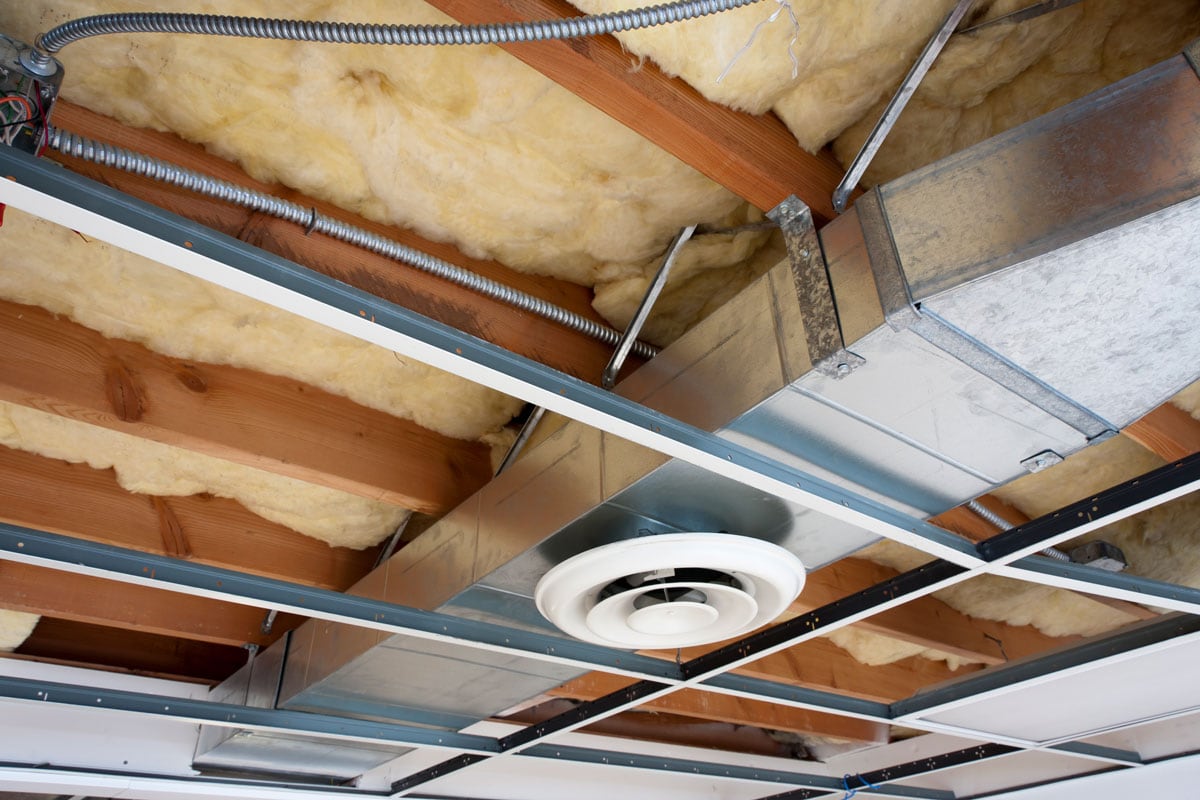 Fiberglass insulation at an attic