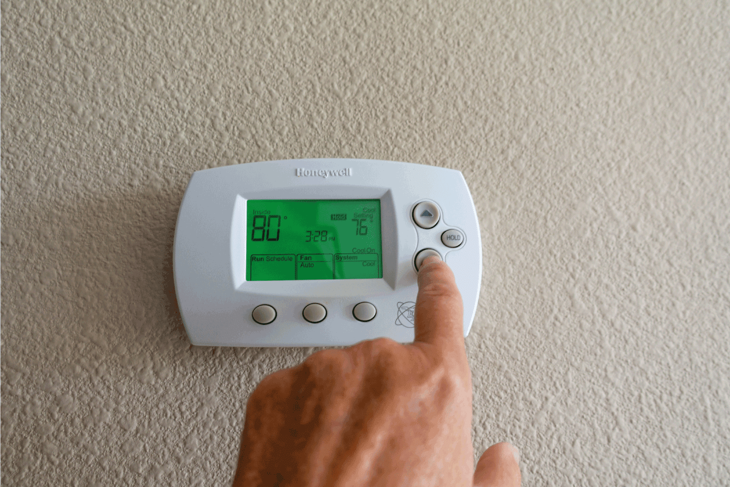 Honeywell programmable thermostat to control the air conditioner and heater in a home.