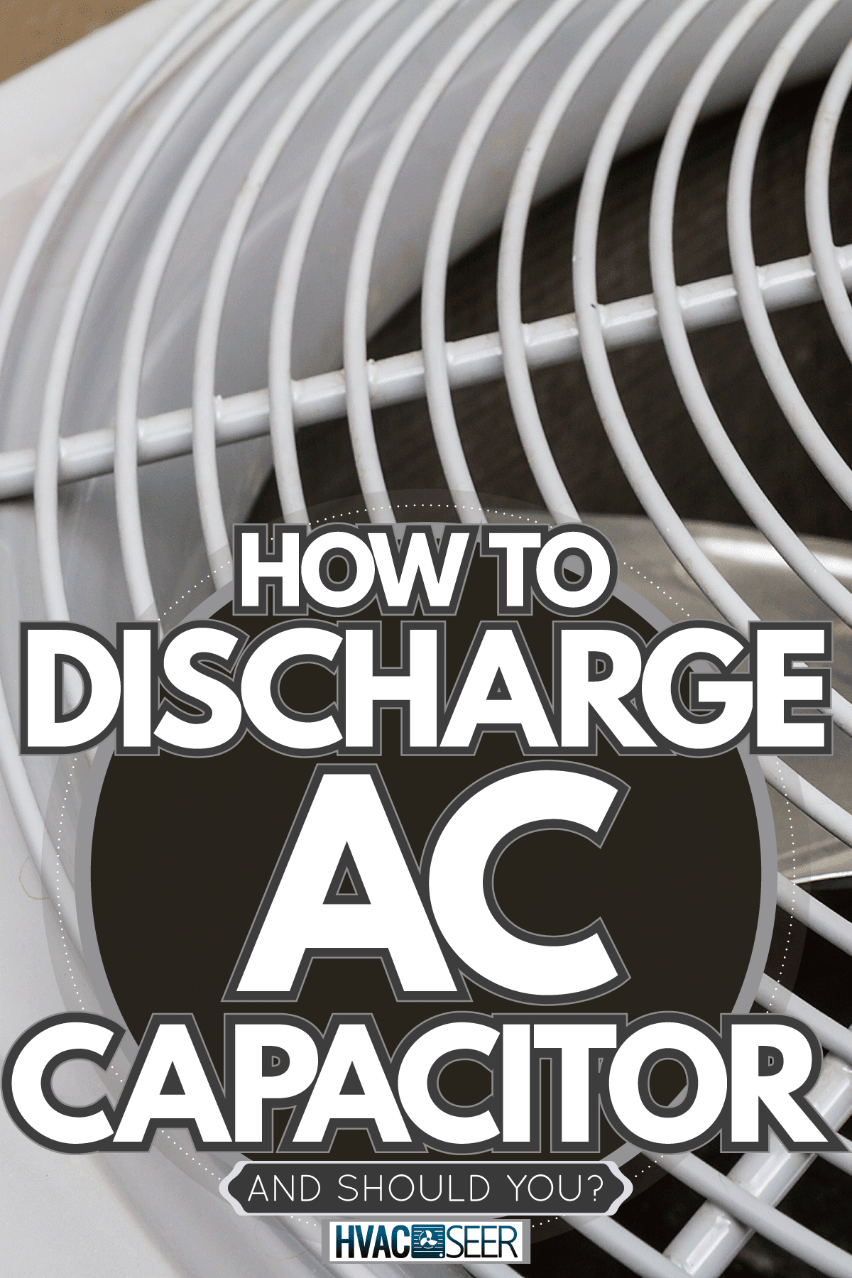 A white air conditioner, How To Discharge AC Capacitor [And Should You?]