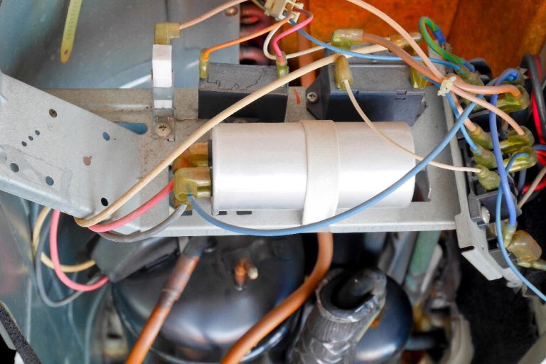 Inside the condenser unit of air conditioner unit, 6 Best Hard Start Kits For AC Compressor