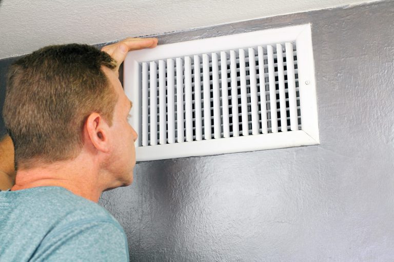 Inspecting a Home Air Vent for Maintenance, How Much Clearance Is Needed For Air Return?