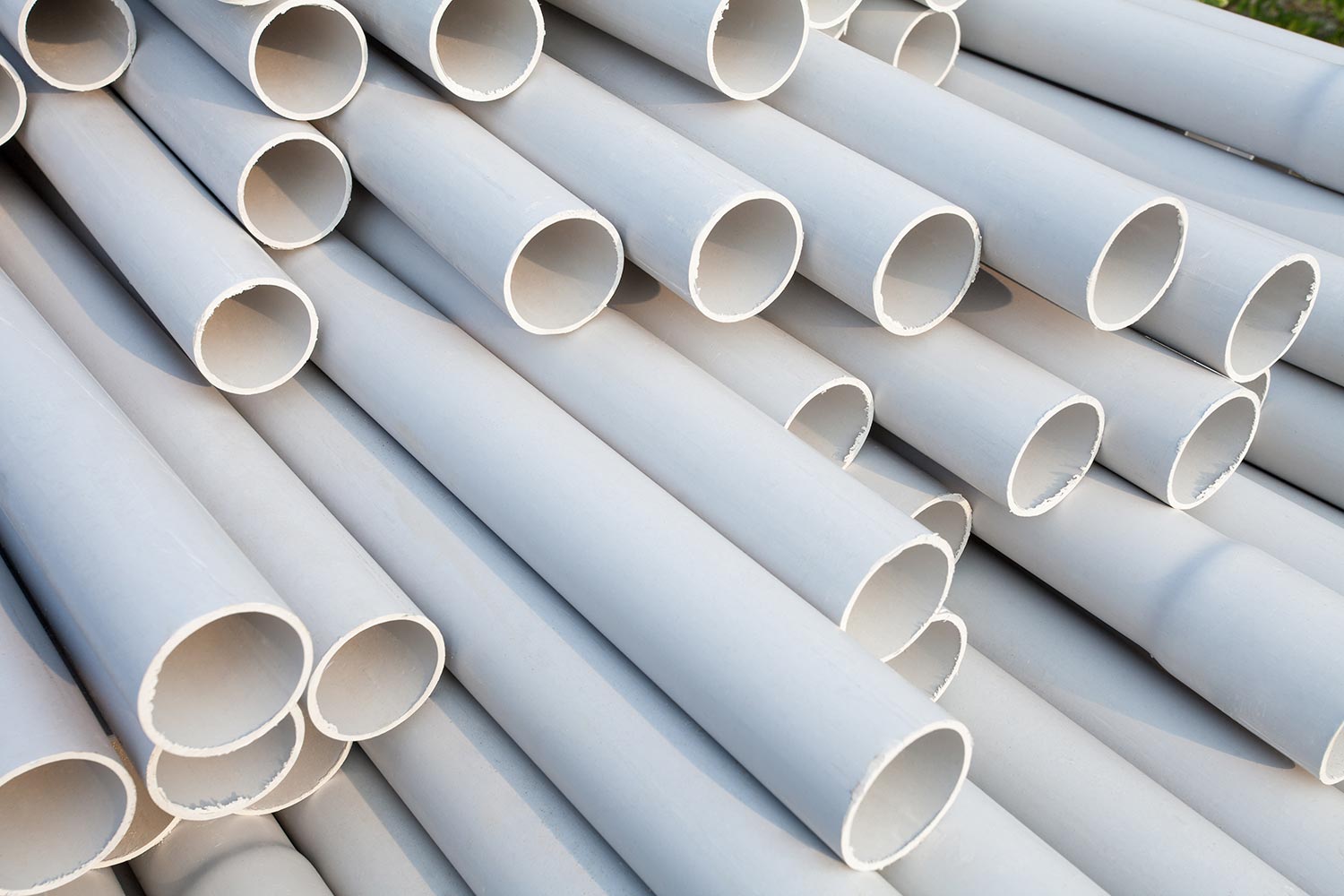 PVC pipes stacked at construction site