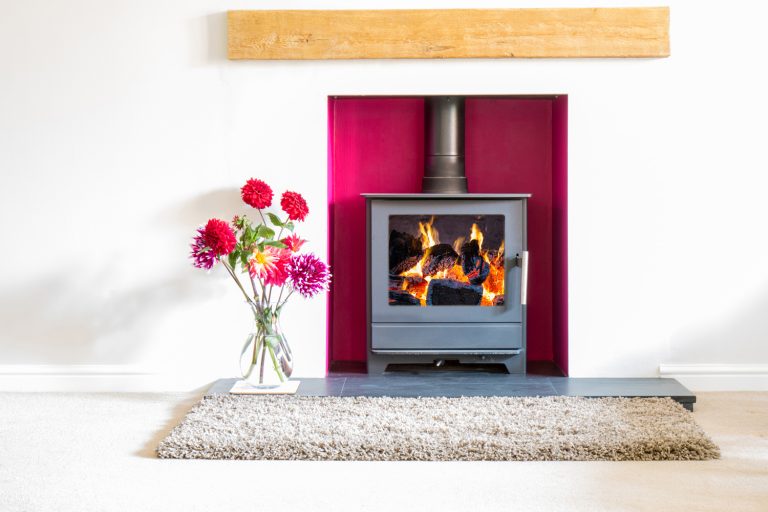 Wood burning stove, with blazing log fire - CHIMNEY FLUE - FIREPLACE FLUE - How To Open A Fireplace Flue