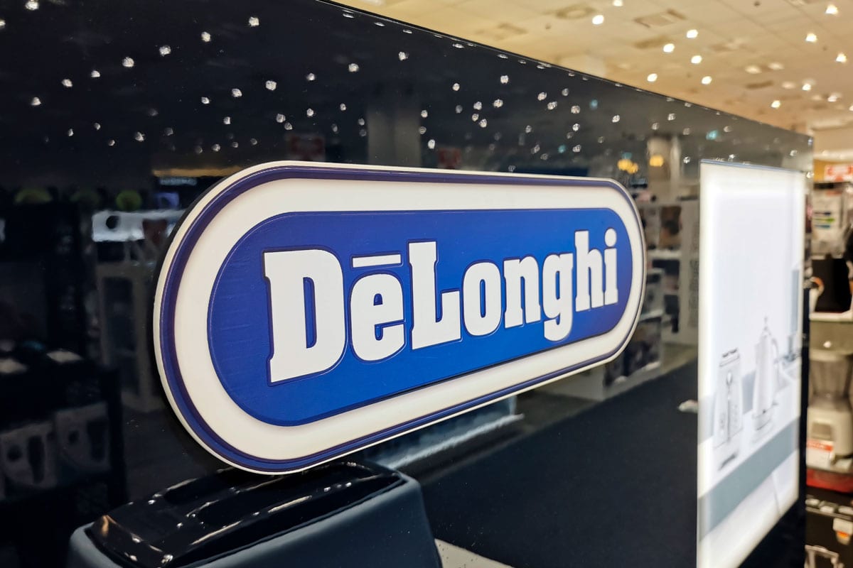a blue Delonghi brand logo in electronics and home appliance store