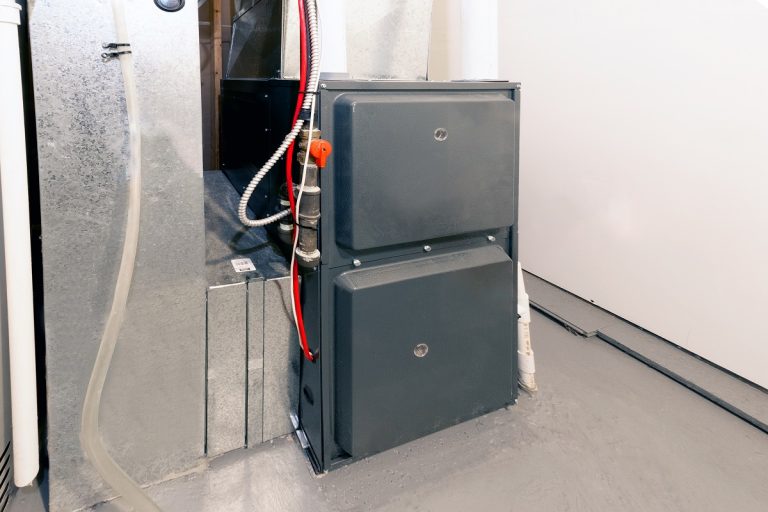 A home high energy efficient furnace in a basement, Carrier Furnace Beeping - Why And What To Do