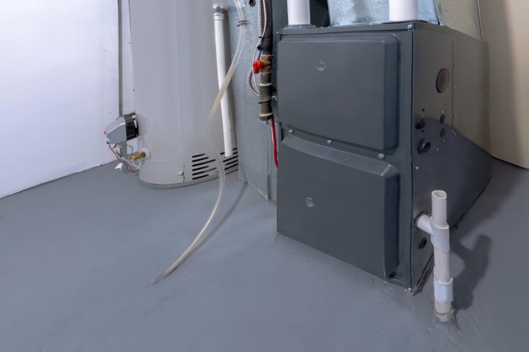 A home high energy efficient furnace in a basement. - Does A New Furnace Come With A Coil?