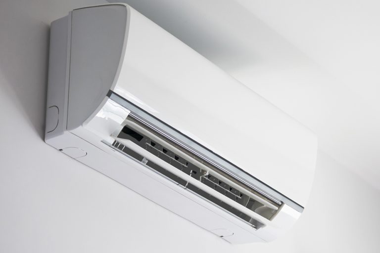 Air conditioner on white wall room interior, How To Check AC Temperature Differential