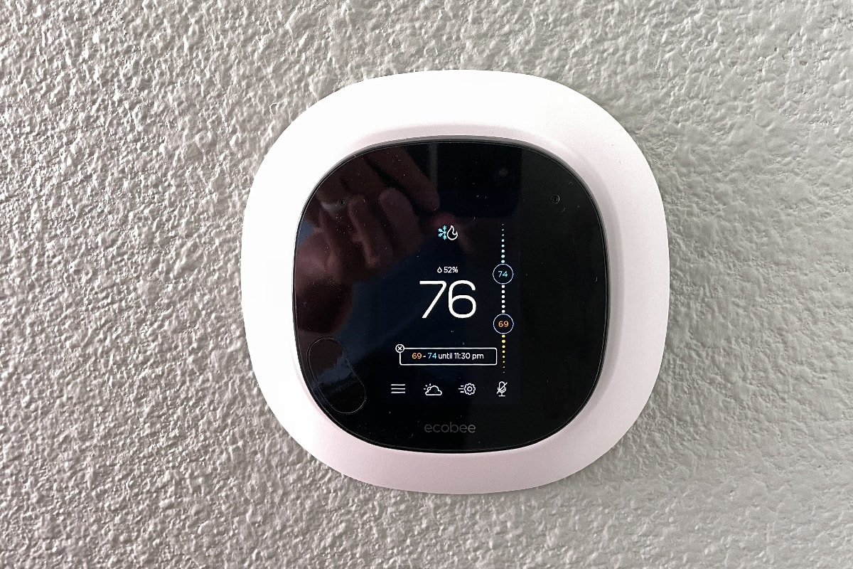 An ecobee smart thermostat in a home