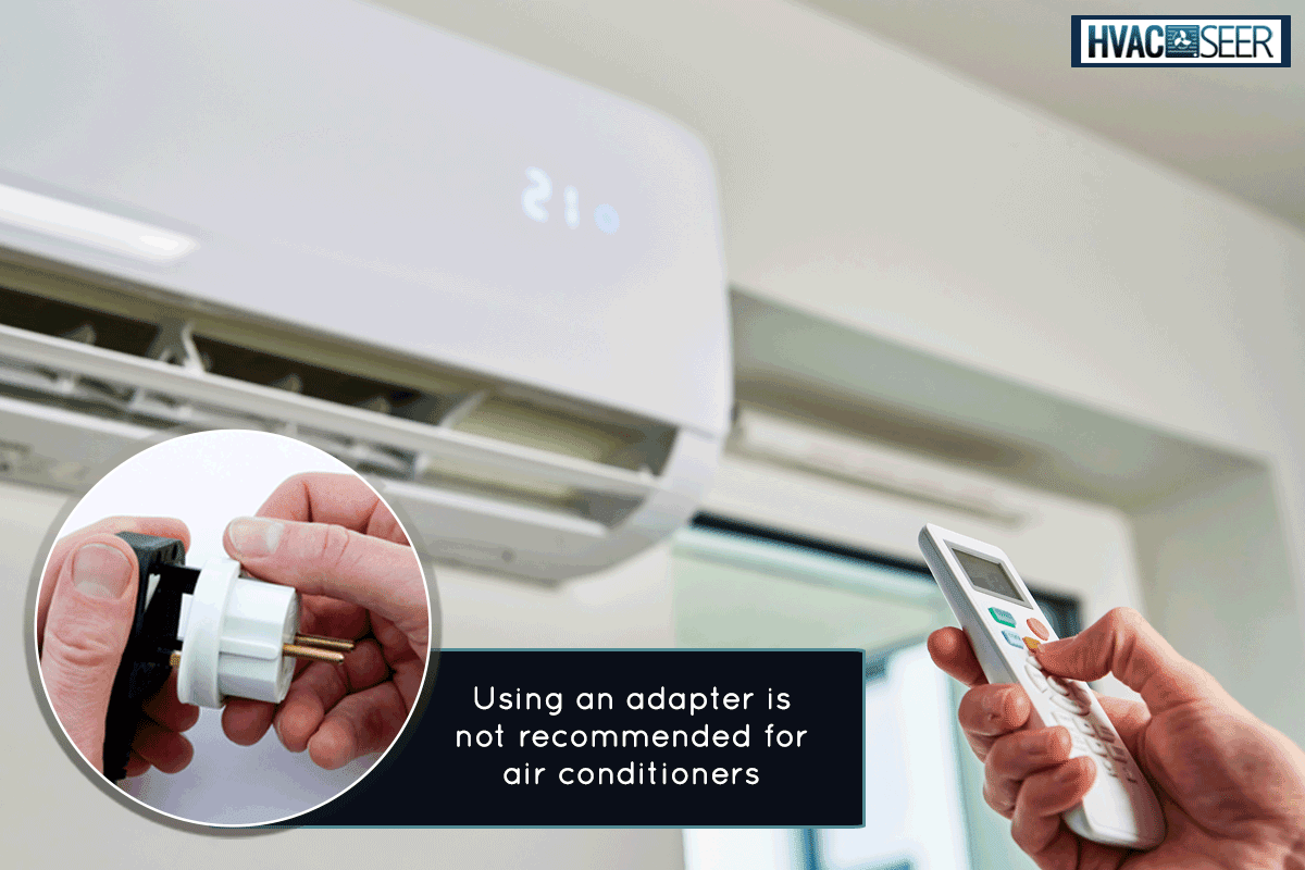 A hand adjusting temperature on air conditioner, Can You Use An Adapter For An Air Conditioner?