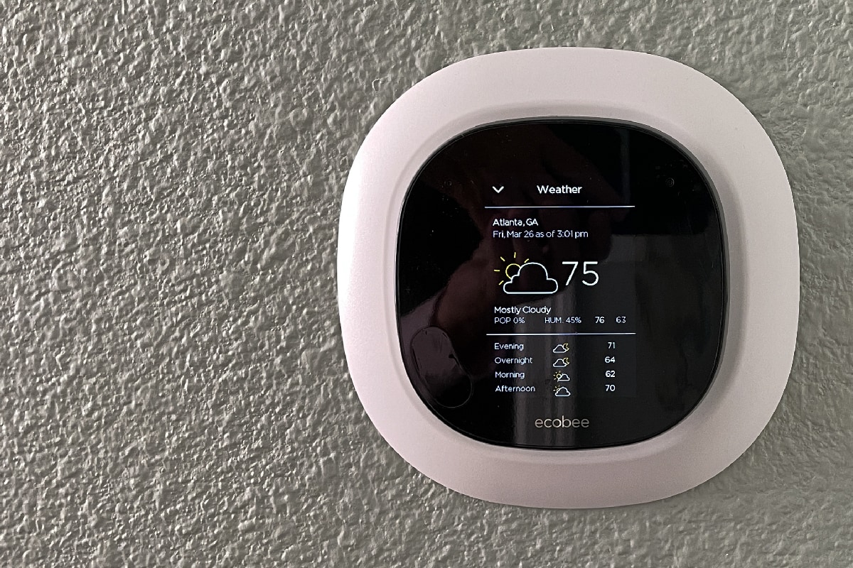 Ecobee smart thermostat installed on the wall