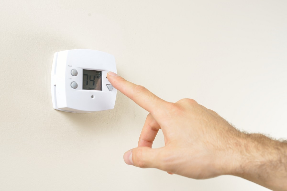 Faulty Thermostat - hand adjusting thermostat