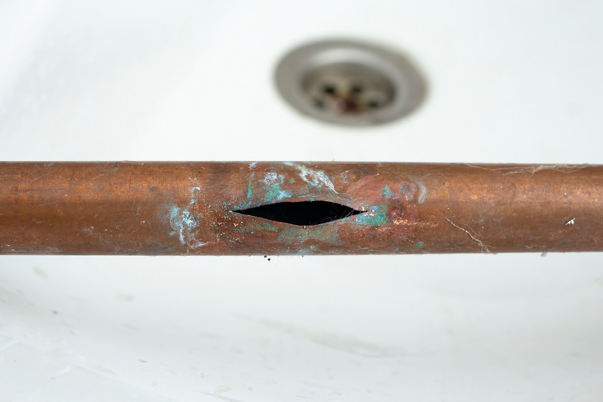 Cracked,Open,Copper,Pipe,Due,To,Freezing,With,Water,Inside,