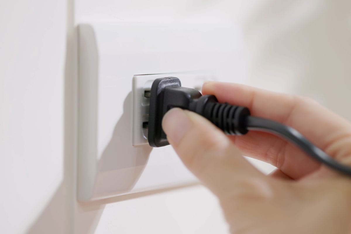 Plugging in electrical cords socket